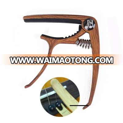 made in China wood acoustic guitar capo